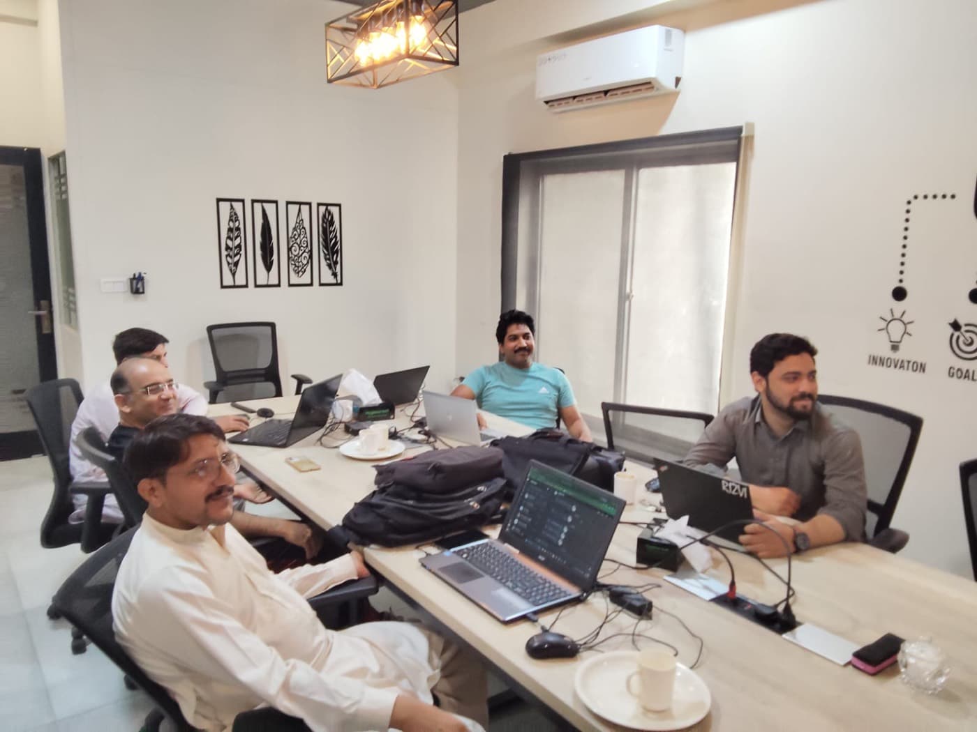 SellerCrush on-hand Amazon training session — participants working on live seller accounts
